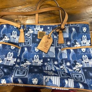 Dooney and Bourke’s Disney Magic Kingdom Tote bag
